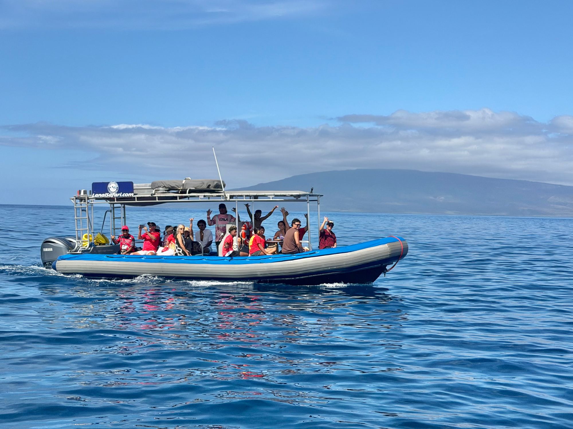 The Maui Whale Adventures rigid inflatable boat under way off West Maui